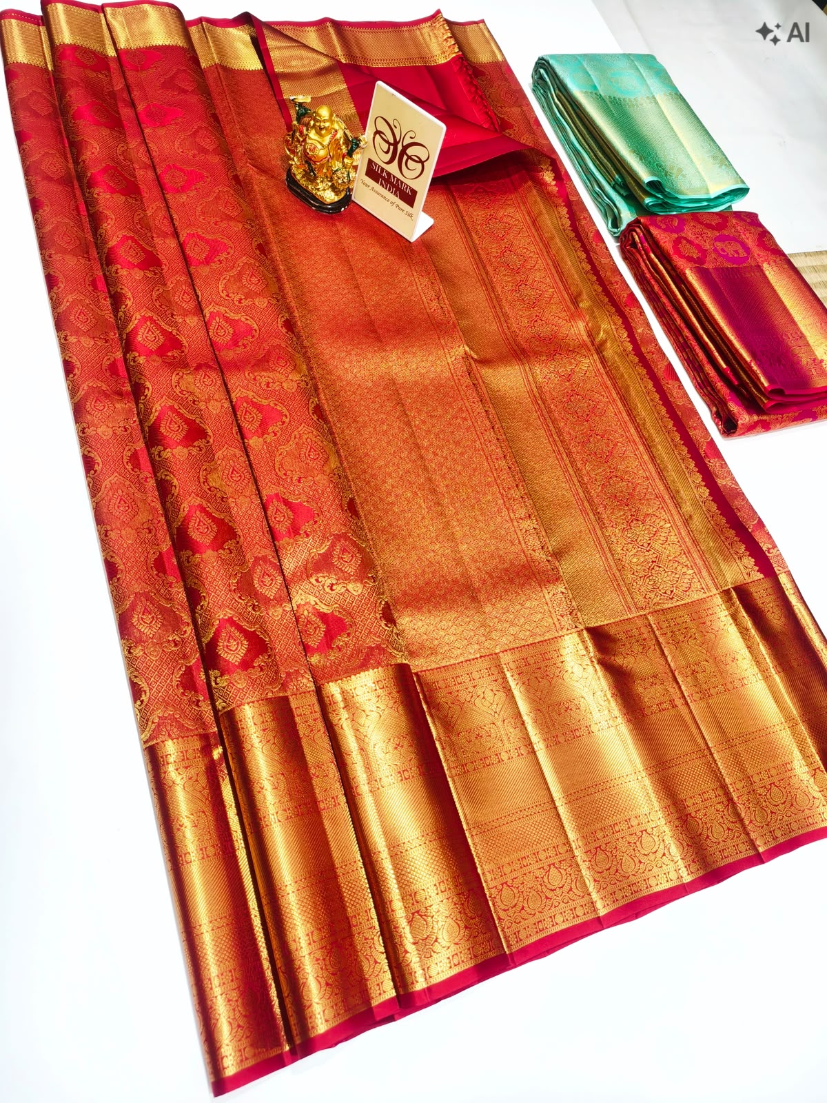 Kancheepuram pure silk saree in red and teal with heavy gold zari body and border