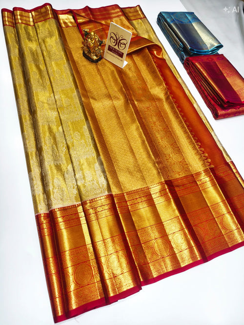 Gold and red Kancheepuram pure silk saree with heavy zari border