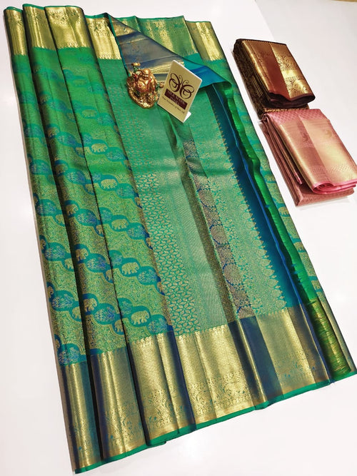 Emerald green Kancheepuram pure silk saree with traditional elephant zari motifs and gold border