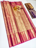 Magenta pink and gold Kancheepuram pure silk saree with zari border and floral motifs