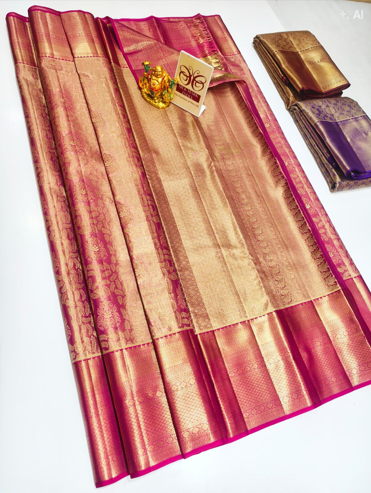 Magenta pink and gold Kancheepuram pure silk saree with zari border and floral motifs